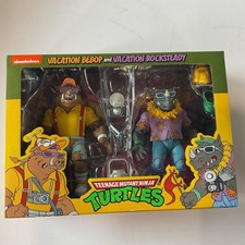 NECA Teenage Mutant Ninja Turtles Cartoon Vacation Bebop and Rocksteady 7" Scale Action Figures - 2pk
